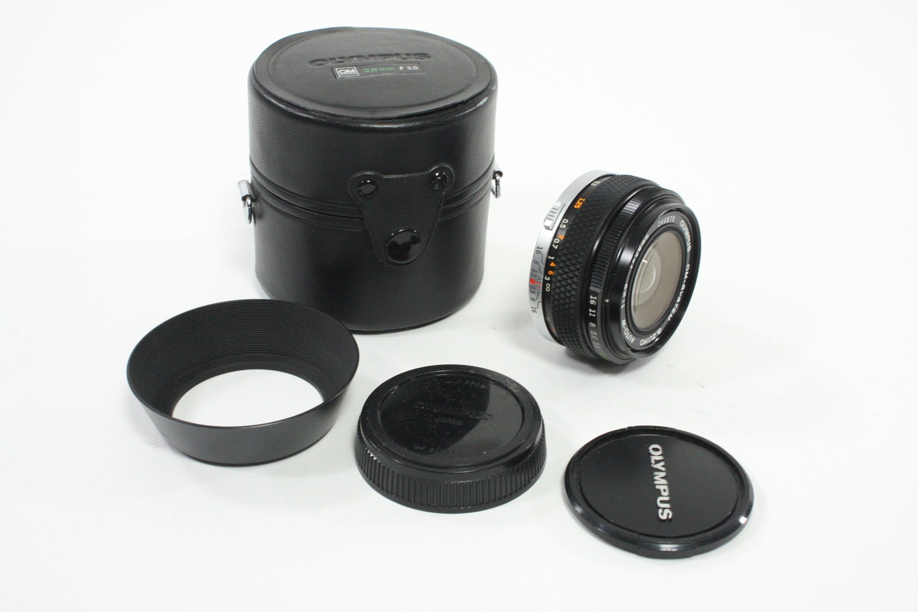 Olympus 28mm f/3.5 Auto-W G. Zuiko Lens for OM Mount with Case and Hood