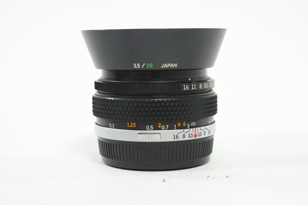 Olympus 28mm f/3.5 Auto-W G. Zuiko Lens for OM Mount with Case and Hood