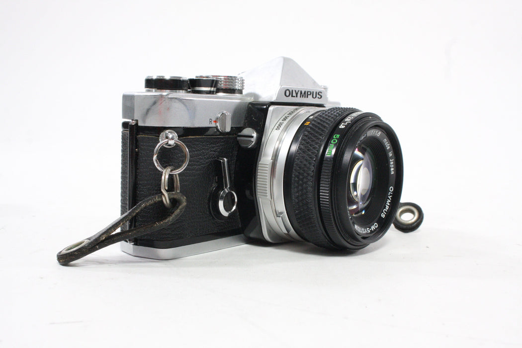 Olympus OM-1 35mm SLR Camera with a 50mm f/1.8 Lens with Case