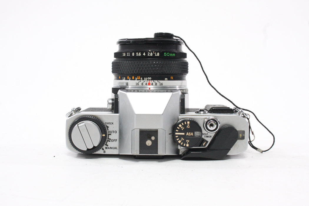 Olympus OMG 35mm SLR Camera with 50mm f/1.8 Lens