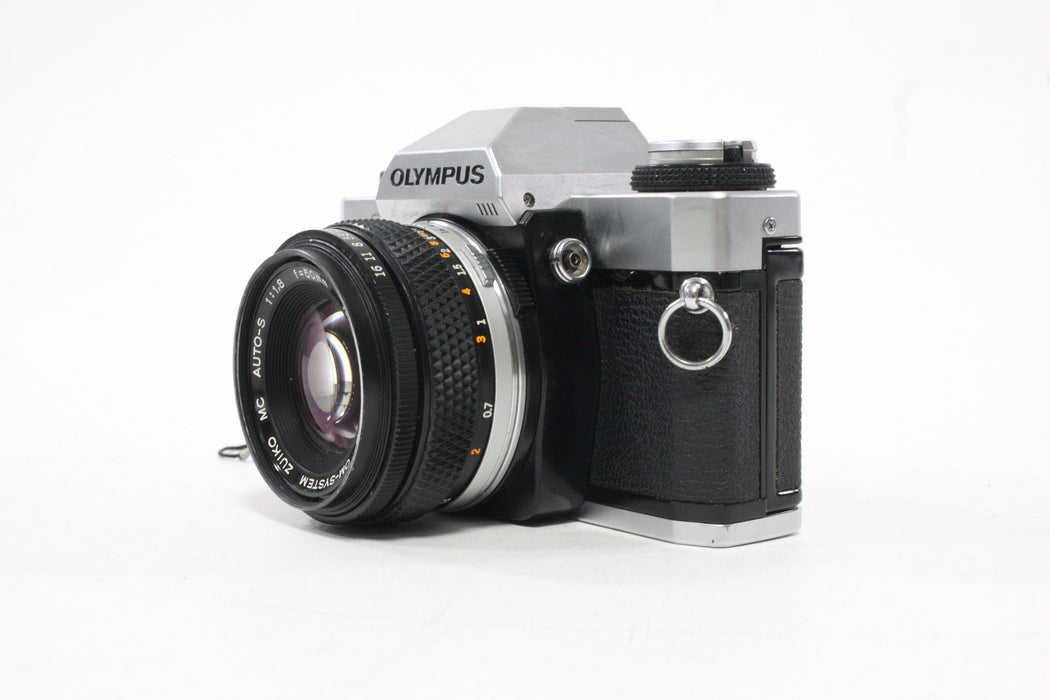 Olympus OMG 35mm SLR Camera with 50mm f/1.8 Lens