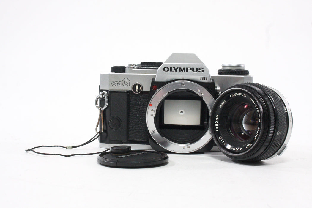 Olympus OMG 35mm SLR Camera with 50mm f/1.8 Lens