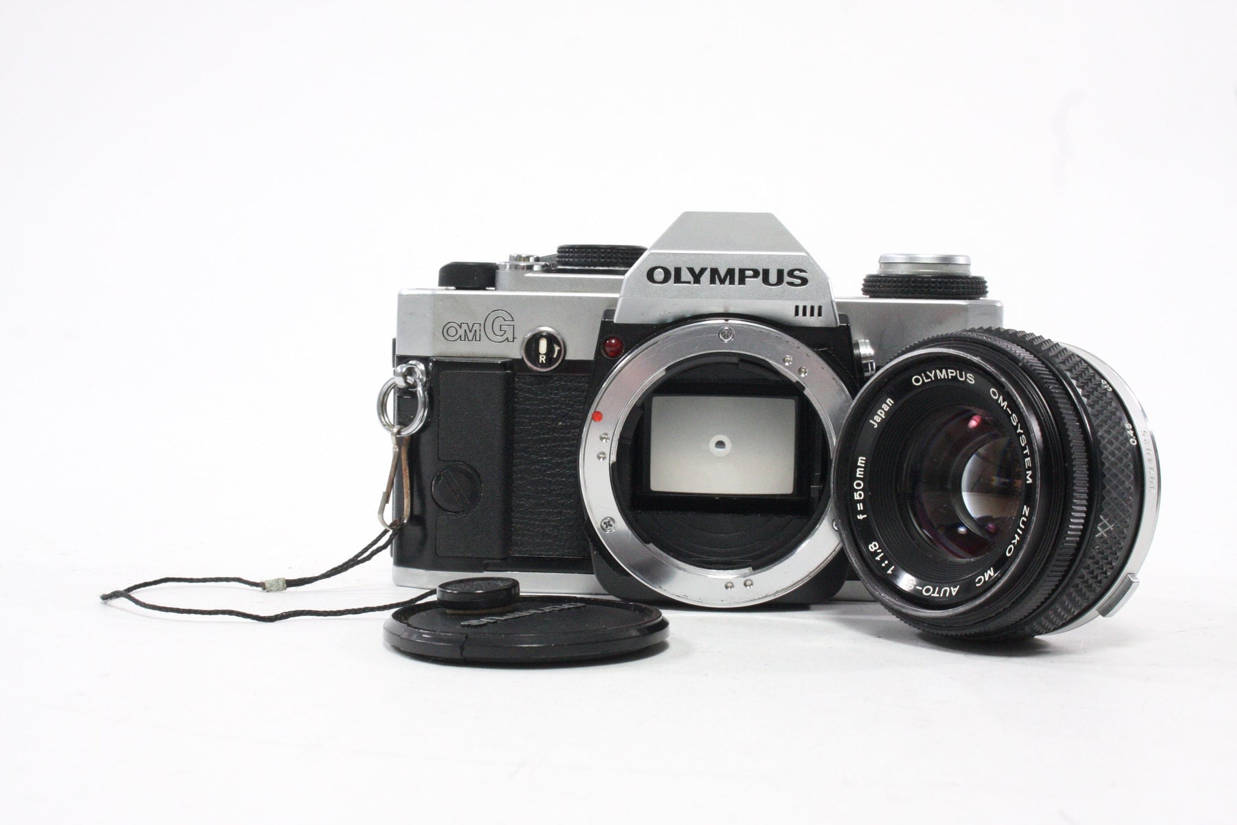 Olympus OMG 35mm SLR Camera with 50mm f/1.8 Lens
