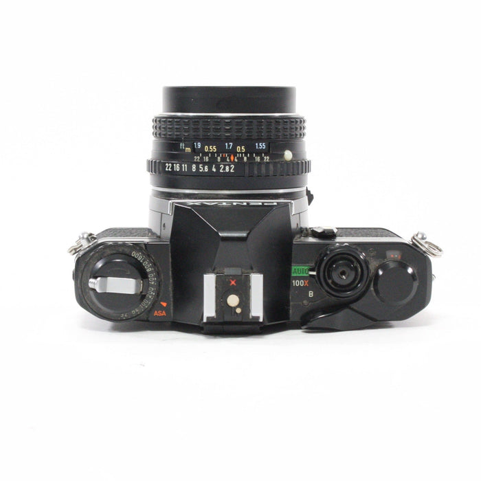 Pentax MV1 with a 50mm f/2 lens.