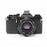 Pentax MV1 with a 50mm f/2 lens.
