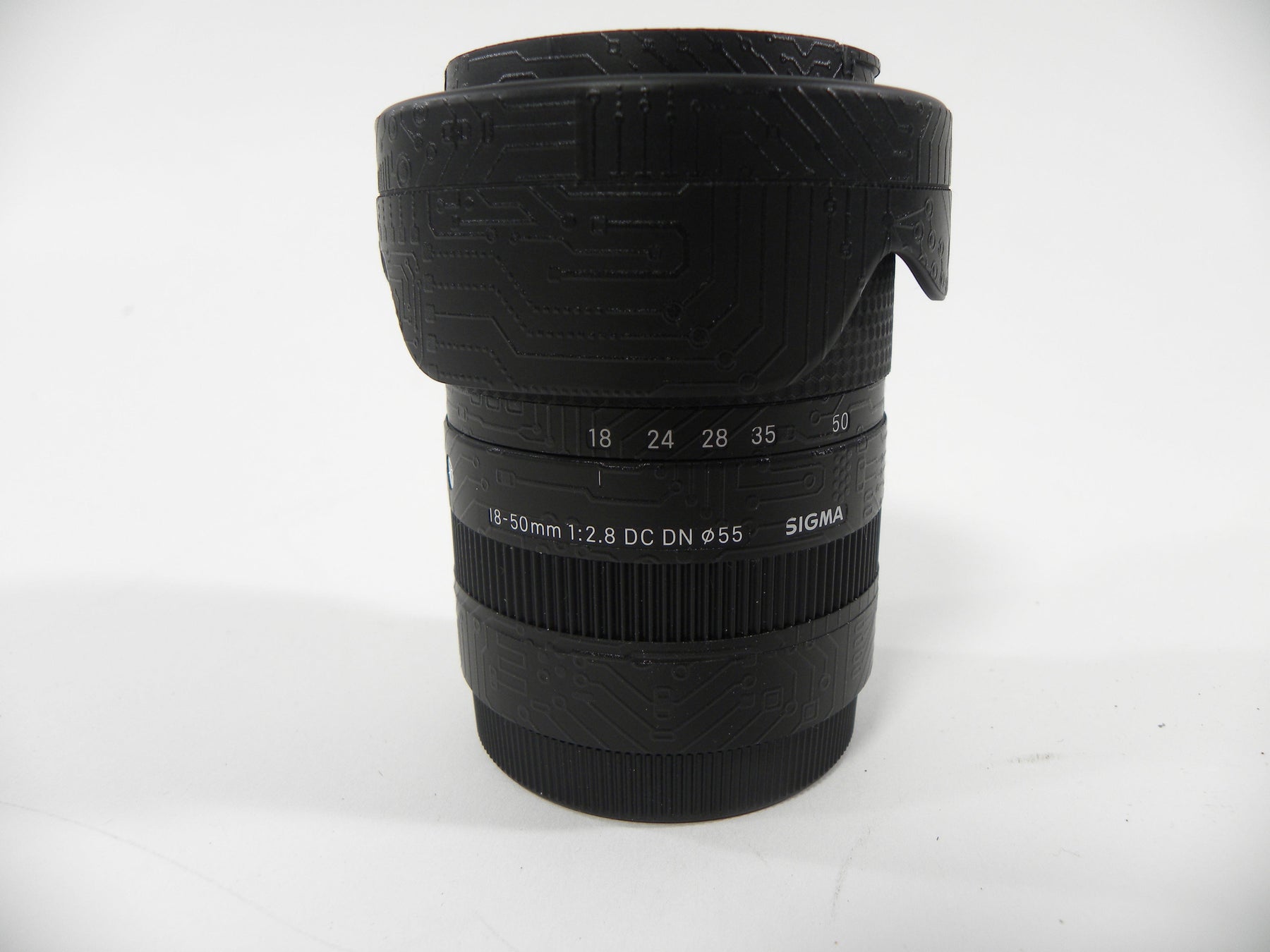 Sigma DC DN 18-50mm f2.8 Sony E Mount w/Skin