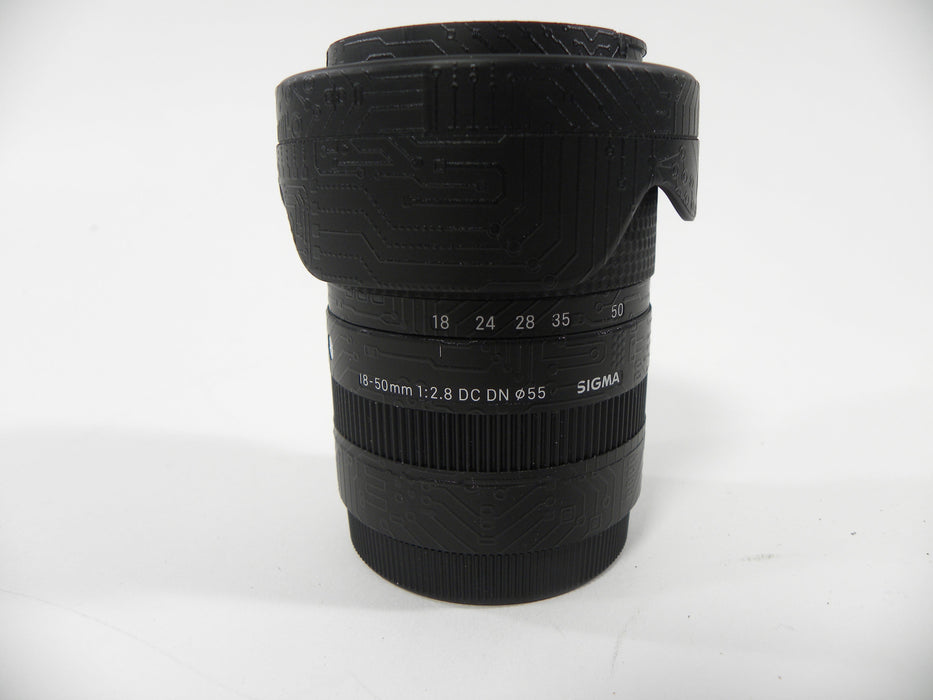 Sigma DC DN 18-50mm f2.8 Sony E Mount w/Skin