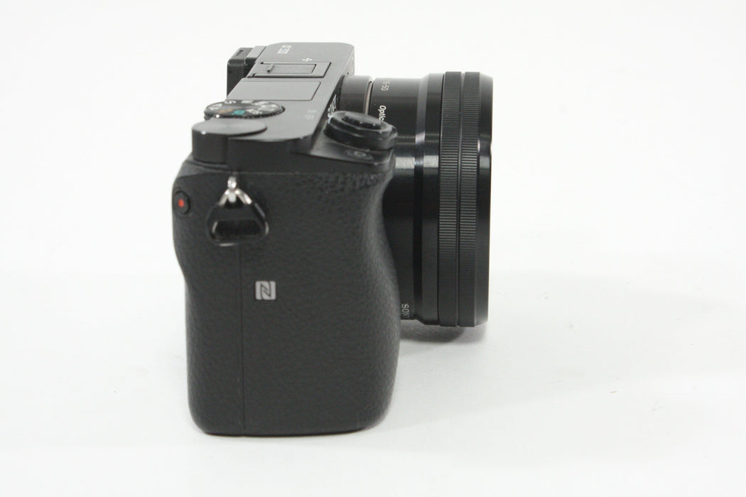 Sony a6000 w/16-60mm F3.5-5.6 Lens + SmallRig Cage and Battery Grip - Shutter Count 7307