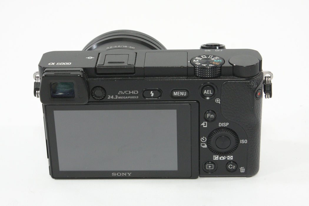 Sony a6000 w/16-60mm F3.5-5.6 Lens + SmallRig Cage and Battery Grip - Shutter Count 7307