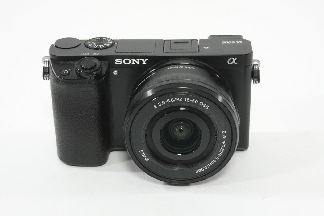 Sony a6000 w/16-60mm F3.5-5.6 Lens + SmallRig Cage and Battery Grip - Shutter Count 7307