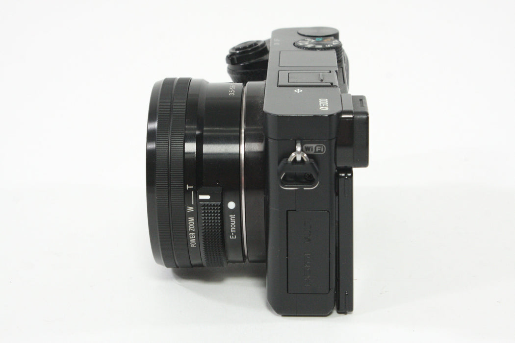 Sony a6000 w/16-60mm F3.5-5.6 Lens + SmallRig Cage and Battery Grip - Shutter Count 7307