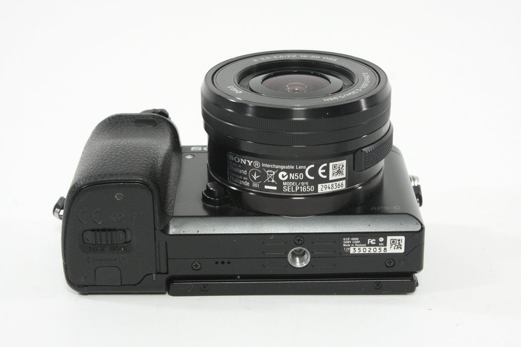 Sony a6000 w/16-60mm F3.5-5.6 Lens + SmallRig Cage and Battery Grip - Shutter Count 7307