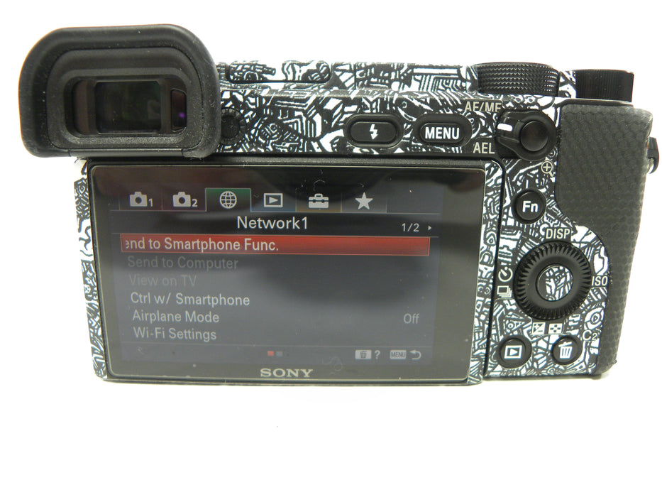 Sony a6400 24.2mp Mirrorless Digital camera Body Only  w/Skin Shutter Ct. 5,061