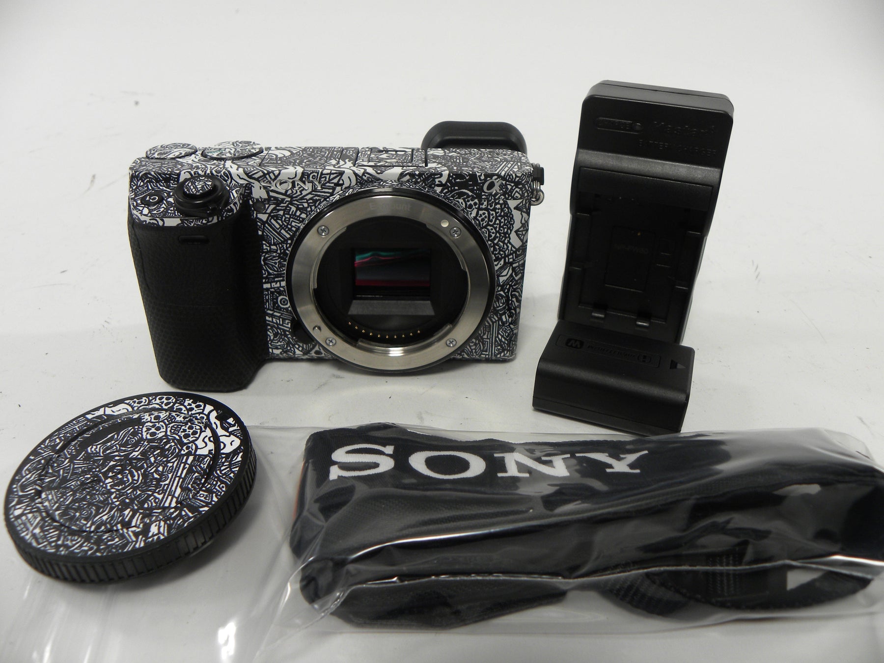 Sony a6400 24.2mp Mirrorless Digital camera Body Only  w/Skin Shutter Ct. 5,061