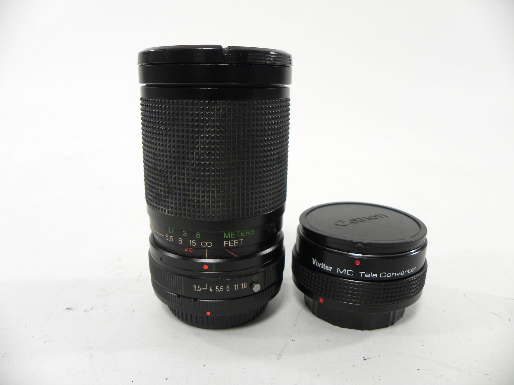 Vivitar MC 28-85mm f3.5-4.5 w/tele converter Canon Adapter